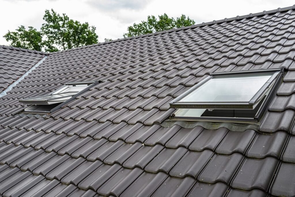 Siding Installation in Central Iowa, two-open-roof-windows-in-the-attic-visible-anthracite-ceramic-tiles-