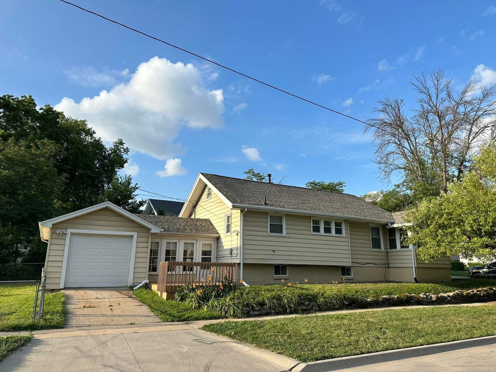 Hutch Unlimited Roofing crew completing a shingle roof replacement in the Des Moines metro, serving Norwalk, Iowa