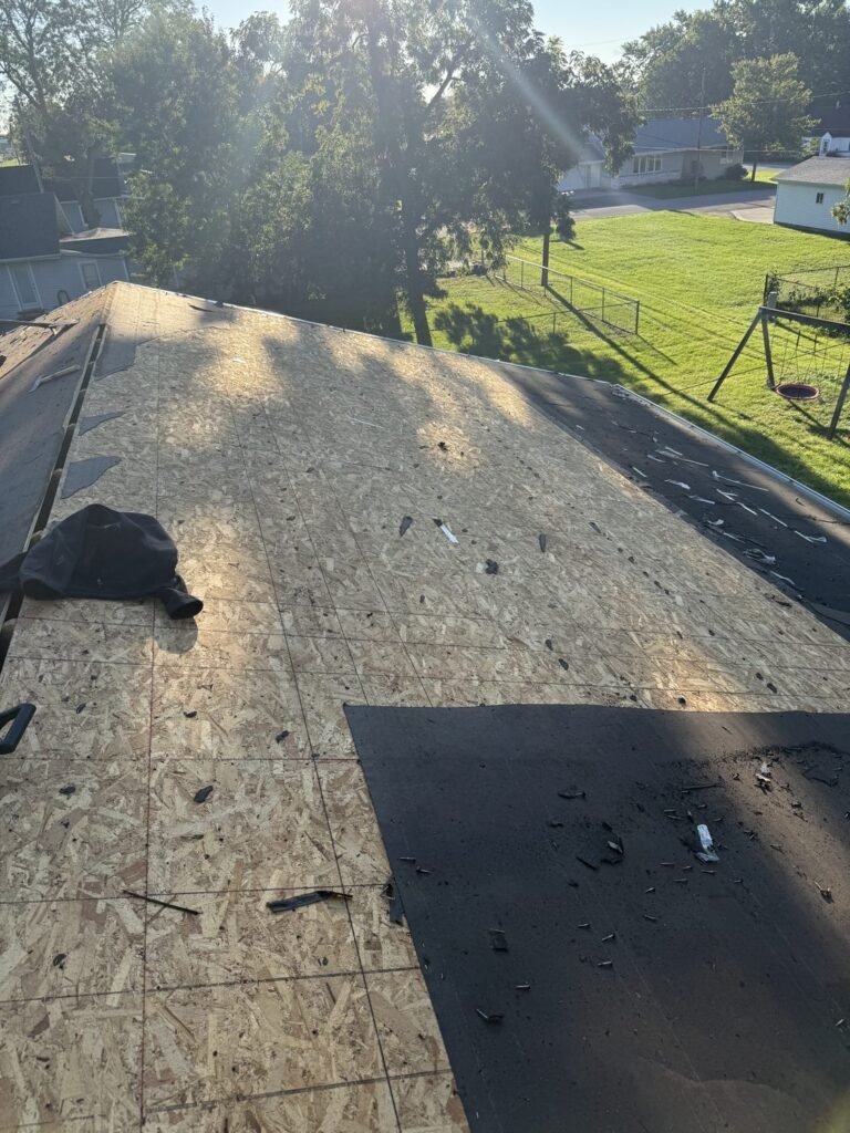 Exposed OSB roof deck after complete shingle tear-off by Hutch Unlimited Roofing