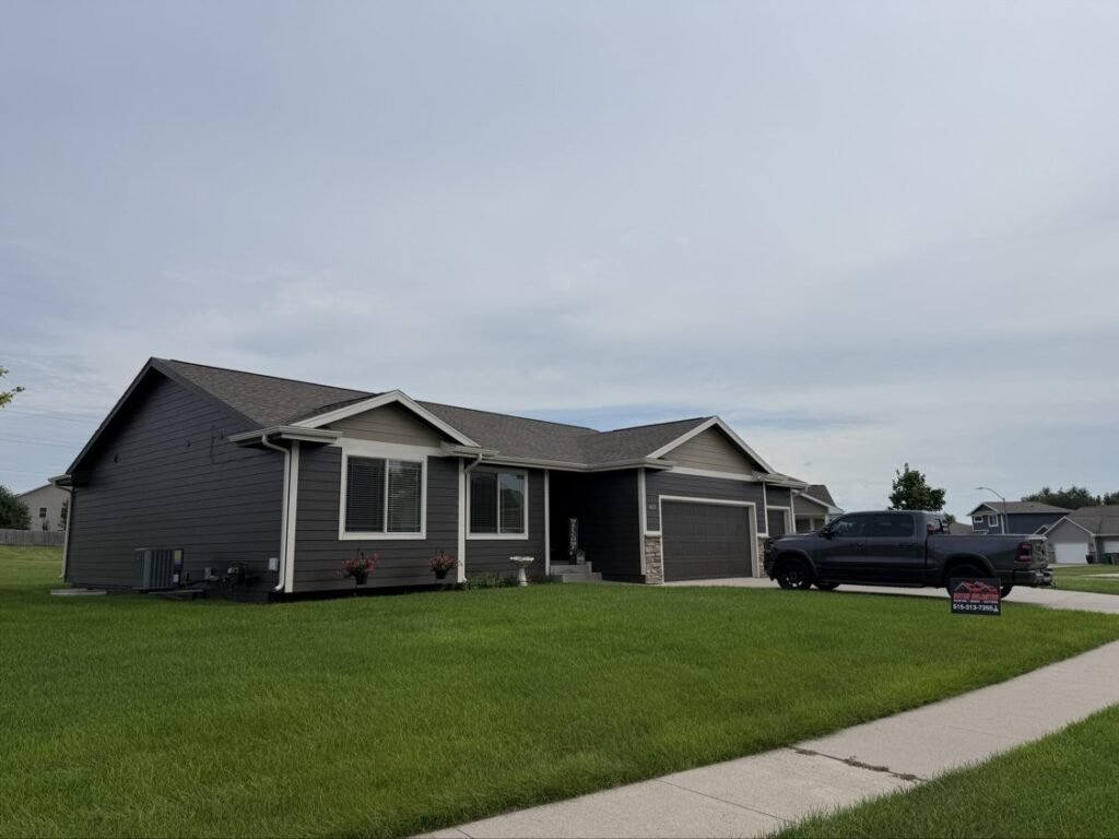 Completed shingle roof replacement by Hutch Unlimited Roofing in Grimes, Iowa