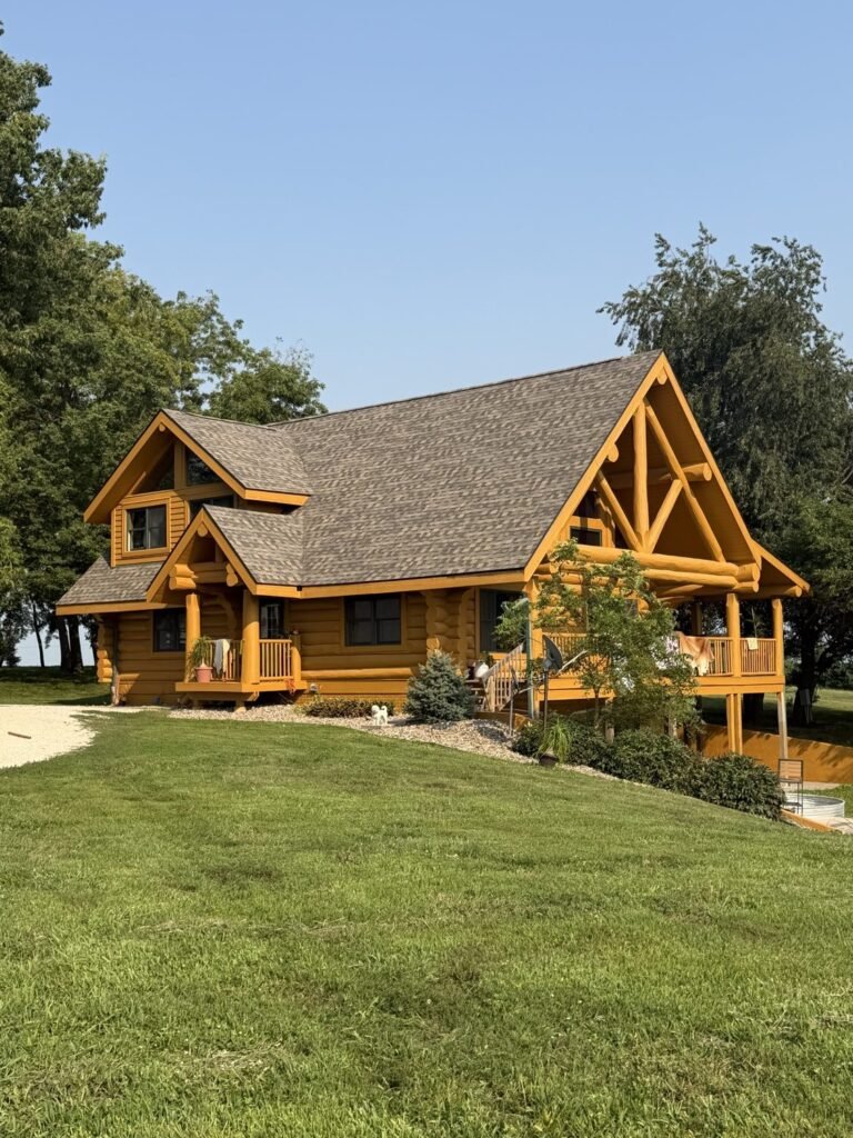 New shingle roof on a log cabin by Hutch Unlimited Roofing, Central Iowa