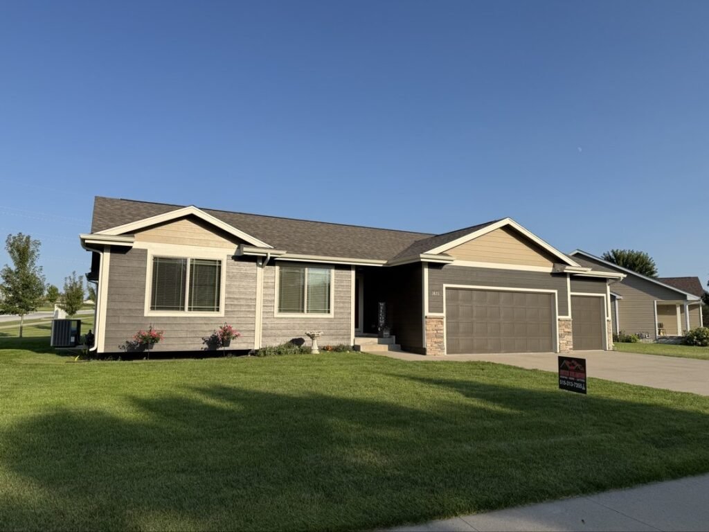New architectural shingle roof completed by Hutch Unlimited Roofing in Grimes, Iowa